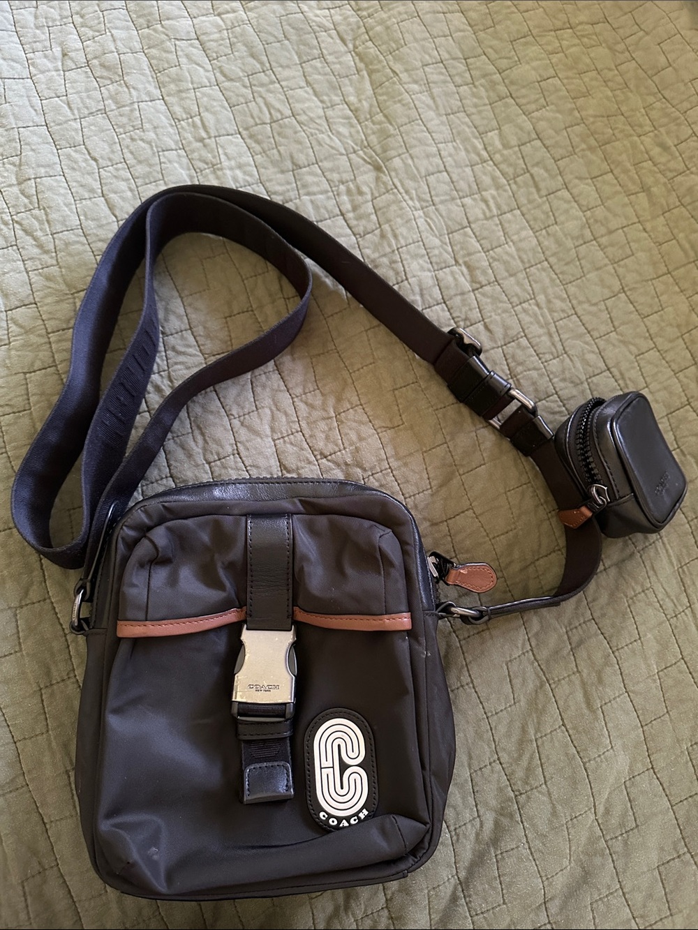 Coach Men’s Black Messenger Bag with Brown Trim and Silver Buckle